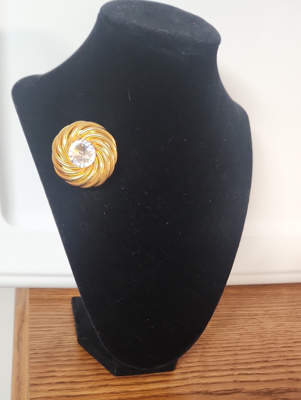 Large Gold-Tone Swirl with Clear Crystal Center Brooch